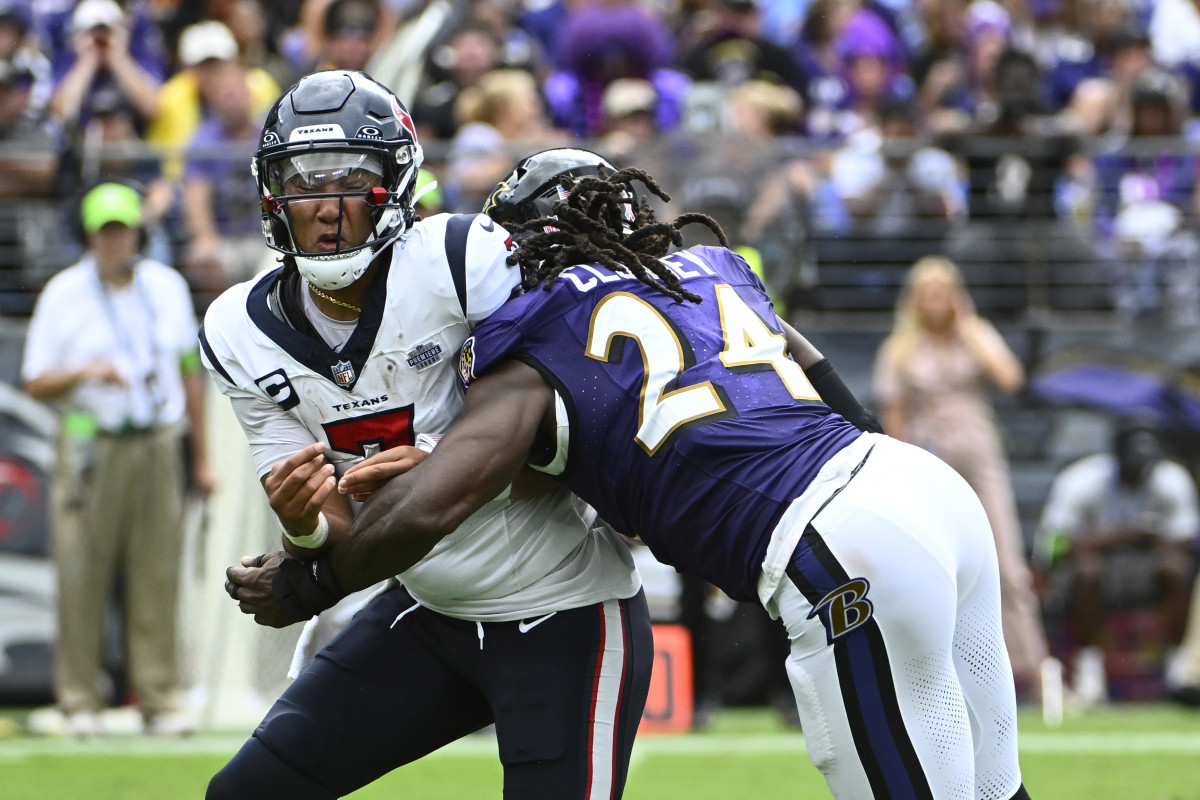 Houston Texans quarterback C.J. Stroud (7) is pressured by Baltimore Ravens linebacker Jadeveon Clowney (24) during the second half at M&T Bank Stadium.